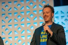 Avi Schwab, on stage at DrupalCon Chicago