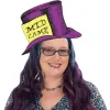 Smiling person with purple and blue hair wearing glasses and a whimsical purple top hat labeled “MidCamp.”